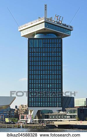 Stock Photo - Eye Film Museum, A' DAM TOWER (formerly Shell Tower) with swing on the viewing platform, Amsterdam, North Holland, Holland, Netherlands. Fotosearch