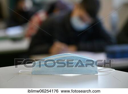 Face mask on school desk, classroom teaching, corona crisis, Stuttgart, Baden-Württemberg, Germany, Europe View Large Photo Image Stock Photograph - Face mask on school desk, classroom teaching, corona crisis, Stuttgart, Baden-Württemberg, Germany, Europe. Fotosearch