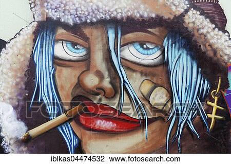 Face of a woman with cigarette and bandaid on cheek, graffiti, street art, Düsseldorf, North Rhine-Westphalia, Germany, Europe View Large Photo Image Stock Image - Face of a woman with cigarette and bandaid on cheek, graffiti, street art, Düsseldorf, North Rhine-Westphalia, Germany, Europe. Fotosearch