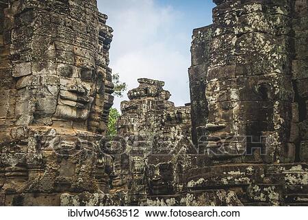 Stock Image - Face Towers, Stone Faces, Bodhisattva Lokeshvara, Avalokiteshvara, Temple Ruins, Bayon Temple, Angkor Thom Complex, Angkor Archaeological Park, Siem Reap Province, Cambodia, Asia. Fotosearch