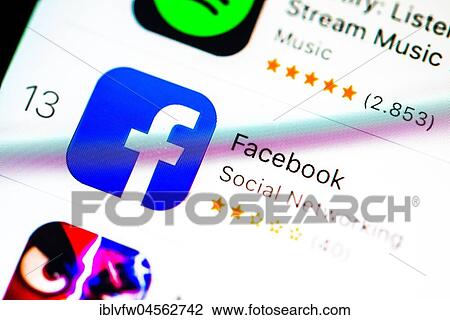 Stock Image - Facebook app in the Apple App Store, social network, app icon, display on a screen from mobile phone, iPhone, iOS, smartphone, macro recording, detail, full-frame format. Fotosearch