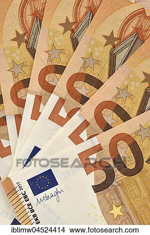 Fan with 50 euro banknotes, April 2017, front View Large Photo Image Picture - Fan with 50 euro banknotes, April 2017, front. Fotosearch