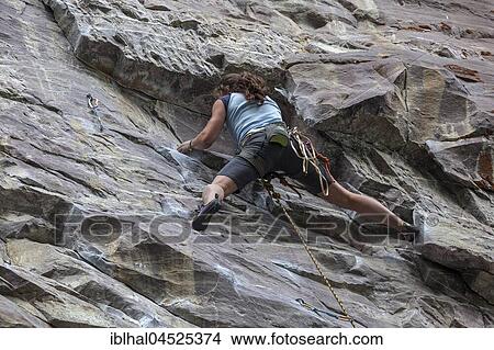 Female mountaineer, climber in a steep face, Banff National Park, Rocky Mountains, Alberta, Canada, North America View Large Photo Image Picture - Female mountaineer, climber in a steep face, Banff National Park, Rocky Mountains, Alberta, Canada, North America. Fotosearch