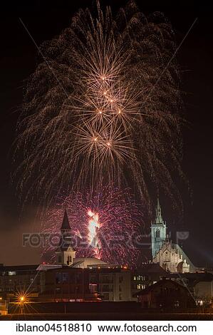 Stock Image - Fireworks, Spitalskirche and parish church, Schwaz, Tyrol, Austria, Europe. Fotosearch