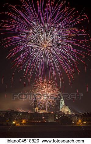 Stock Image - Fireworks, Spitalskirche and parish church, Schwaz, Tyrol, Austria, Europe. Fotosearch