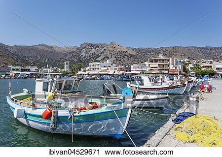 Fishing boats in Lake Voulismeni, Agios Nikolaos, Crete, Greece, Europe View Large Photo Image Stock Image - Fishing boats in Lake Voulismeni, Agios Nikolaos, Crete, Greece, Europe. Fotosearch