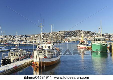 Stock Image - Fishing boats in the harbour, Bodø, Nordland, Norway, Europe. Fotosearch