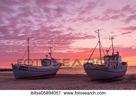 Fishing boats on the beach at sunset, Vorupör, Nordjylland, Denmark, Europe View Large Photo Image Stock Image - Fishing boats on the beach at sunset, Vorupör, Nordjylland, Denmark, Europe. Fotosearch