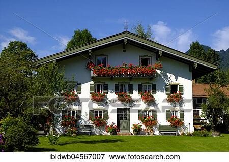 Flower decoration at a farm near Lenggries Isarwinkel, Tölzer Land, with Brauneck, Oberbayern, Bavaria, Germany, Europe View Large Photo Image Stock Photo - Flower decoration at a farm near Lenggries Isarwinkel, Tölzer Land, with Brauneck, Oberbayern, Bavaria, Germany, Europe. Fotosearch