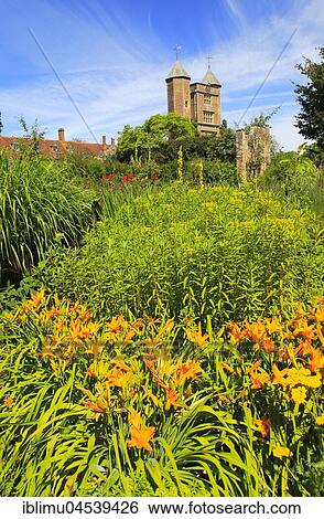 Flowers and red brick tower, Sissinghurst castle gardens, Kent, England, United Kingdom, Europe View Large Photo Image Stock Photograph - Flowers and red brick tower, Sissinghurst castle gardens, Kent, England, United Kingdom, Europe. Fotosearch