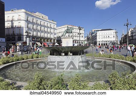 Stock Image - Fountain and equestrian statue of Carlos III, Plaza de la Puerta del Sol, Madrid, Spain, Europe. Fotosearch