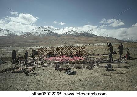 Four men dismantling a yurt, nomadic Kyrgyz, barren plateau of Bozai Gumbaz, Wakhan Corridor, Badakhshan, Afghanistan, Asia View Large Photo Image Stock Photography - Four men dismantling a yurt, nomadic Kyrgyz, barren plateau of Bozai Gumbaz, Wakhan Corridor, Badakhshan, Afghanistan, Asia. Fotosearch