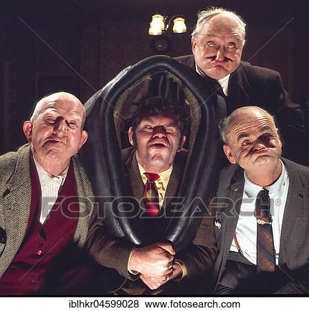 Four men make faces, England, Great Britain View Large Photo Image Stock Photo - Four men make faces, England, Great Britain. Fotosearch