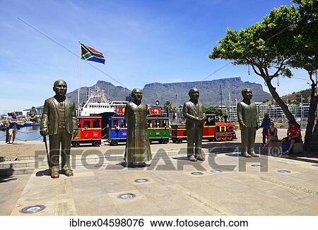 Four statues of Nobel laureates Albert Lithuli, Desmond Tutu, FW de Klerk and Nelson Mandela, Nobel Square, Cape Town, Western Cape, South Africa, Africa View Large Photo Image Stock Photograph - Four statues of Nobel laureates Albert Lithuli, Desmond Tutu, FW de Klerk and Nelson Mandela, Nobel Square, Cape Town, Western Cape, South Africa, Africa. Fotosearch