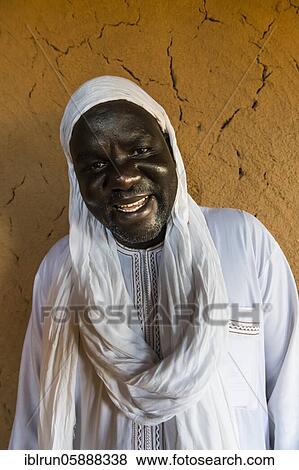 Friendly laughing man with tagelmust, Agadez, Niger, Africa View Large Photo Image Stock Photo - Friendly laughing man with tagelmust, Agadez, Niger, Africa. Fotosearch