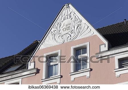 Stock Photo - Gable of a residential house with Art Nouveau stucco decoration, inscription Anno 1909, Düsseldorf, North Rhine-Westphalia, Germany, Europe. Fotosearch