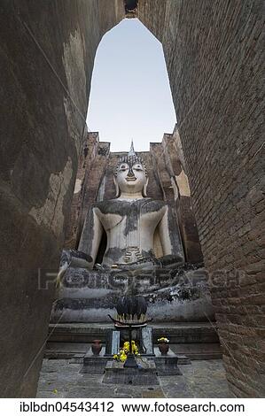 Giant Buddha statue, Wat Si Chum, Sukhothai historical park, Sukhothai, Thailand, Asia View Large Photo Image Stock Image - Giant Buddha statue, Wat Si Chum, Sukhothai historical park, Sukhothai, Thailand, Asia. Fotosearch