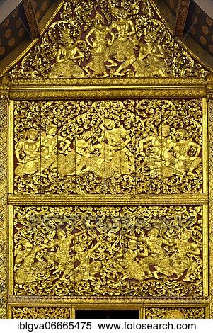 Gilded depictions from the Lao version of the Ramayana, Lao Pha Lak Pha Lam, House of the Royal Funeral Chariot, Wat Xieng Thong Temple, Luang Prabang, Laos, Asia View Large Photo Image Stock Photography - Gilded depictions from the Lao version of the Ramayana, Lao Pha Lak Pha Lam, House of the Royal Funeral Chariot, Wat Xieng Thong Temple, Luang Prabang, Laos, Asia. Fotosearch