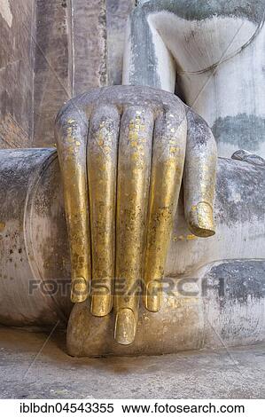 Gilded hand of Phra Atchana Buddha, Wat Si Chum Temple, Sukhothai, Thailand, Asia View Large Photo Image Stock Photography - Gilded hand of Phra Atchana Buddha, Wat Si Chum Temple, Sukhothai, Thailand, Asia. Fotosearch