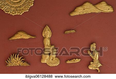 Stock Photo - Gilded wall decorations with depictions from the Jakata narratives about the former lives of the Gautama Buddha, Temple Haw Pha Bang, Luang Prabang, Laos, Temple Haw Pha Bang, Luang Prabang, Laos, Asia. Fotosearch