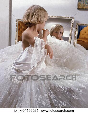 Stock Photography - Girl dresses up, England, Great Britain. Fotosearch