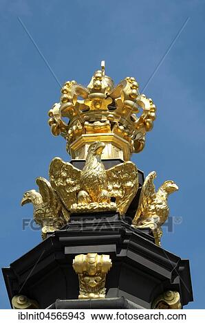 Stock Image - Golden Crown with eagle figures on Kronentor, Zwinger, Dresden, Saxony, Germany, Europe. Fotosearch