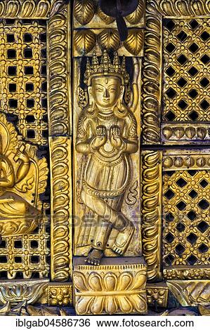 Stock Photograph - Golden statue, Swayambunath or Monkey Temple, Unesco World Heritage Site, Kathmandu, Nepal, Asia. Fotosearch
