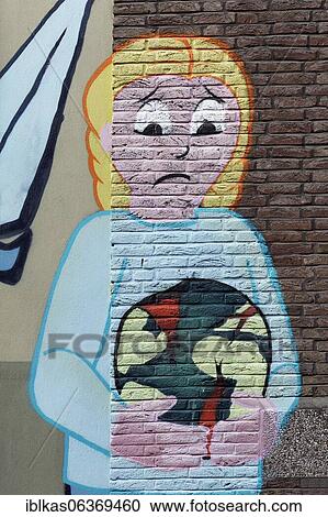 Graffito, child with sad face holds globe, earth in flames, environmental destruction, climate protection, Düsseldorf, North Rhine-Westphalia, Germany, Europe View Large Photo Image Stock Image - Graffito, child with sad face holds globe, earth in flames, environmental destruction, climate protection, Düsseldorf, North Rhine-Westphalia, Germany, Europe. Fotosearch