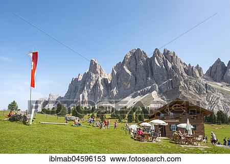 Stock Image - Gschnagenhardt Alm below the Geislerspitzen, behind the Geislergruppe, Villnösstal, Sass Rigais, Dolomites, South Tyrol, Italy, Europe. Fotosearch