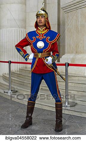 Stock Image - Guardian of the Mongolian armed forces in traditional uniforms in front of the Dschingis-Khan monument at the parliament building, Ulan-Bator, Mongolia, Asia. Fotosearch