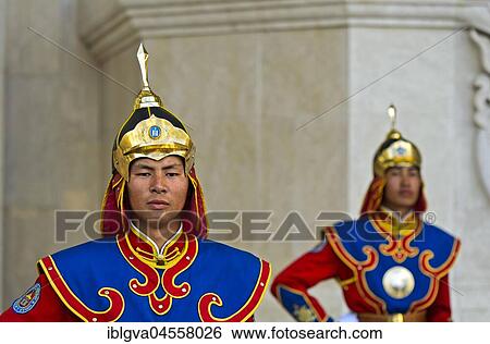 Stock Photograph - Guardian of the Mongolian armed forces in traditional uniforms in front of the Dschingis-Khan monument at the parliament building, Ulan-Bator, Mongolia, Asia. Fotosearch