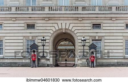 Stock Image - Guardsmen of the Royal Guard with bearskin cap, Buckingham Palace, London, England, Great Britain. Fotosearch