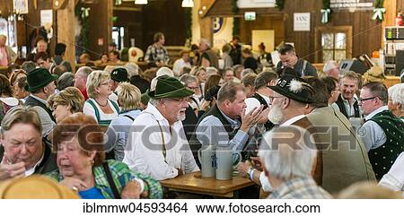 Guests in the beer tent Zur Schönheitskönigin, Alte Wies' n, Oktoberfest, Munich, Upper Bavaria, Bavaria, Germany, Europe View Large Photo Image Picture - Guests in the beer tent Zur Schönheitskönigin, Alte Wies' n, Oktoberfest, Munich, Upper Bavaria, Bavaria, Germany, Europe. Fotosearch