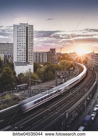 Picture - Hackescher Markt, rail tracks with moving train, Berlin-Mitte, Berlin, Germany, Europe. Fotosearch