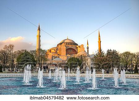 Stock Image - Hagia Sophia at sunset, Ayasofya, fountain in Sultanahmet, Sultan Ahmed Park, Istanbul, European part, Turkey, Asia. Fotosearch