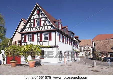 Stock Photo - Half-timbered houses at the Sonnenbrücke with view of the monastery of St. Magdalena, Speyer, Rhineland-Palatinate, Germany, Europe. Fotosearch