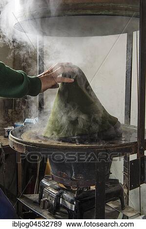 Hand taking hat bodies out of steam boiler, hatmaker workshop, Bad Aussee, Styria, Austria, Europe View Large Photo Image Stock Photo - Hand taking hat bodies out of steam boiler, hatmaker workshop, Bad Aussee, Styria, Austria, Europe. Fotosearch