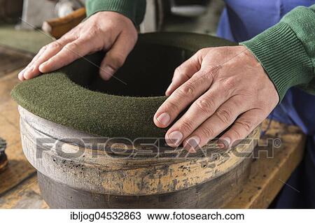 Hands shaping dry wool felt hat over edge mold, hatmaker workshop, Bad Aussee, Styria, Austria, Europe View Large Photo Image Stock Image - Hands shaping dry wool felt hat over edge mold, hatmaker workshop, Bad Aussee, Styria, Austria, Europe. Fotosearch