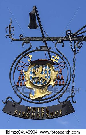 Picture - Hangig shop sign of Hotel Bischofshof, Regensburg, Upper Palatinate, Bavaria, Germany, Europe. Fotosearch