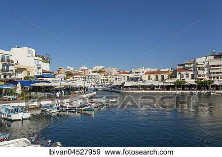 Harbour, Lake Voulismeni in Agios Nikolaos, Crete, Greece, Europe View Large Photo Image Stock Photo - Harbour, Lake Voulismeni in Agios Nikolaos, Crete, Greece, Europe. Fotosearch