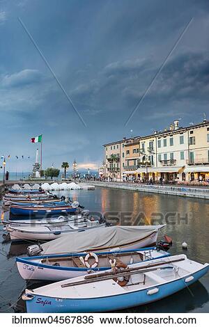 Stock Photograph - Harbour with fishing boats, Lazise, Lake Garda, Veneto, Veneto, Veneto, Italy, Europe. Fotosearch
