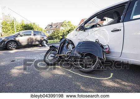 Heavy road accident, Simson scooter crashing in car, police recording accident, Germany, Europe View Large Photo Image Stock Photo - Heavy road accident, Simson scooter crashing in car, police recording accident, Germany, Europe. Fotosearch