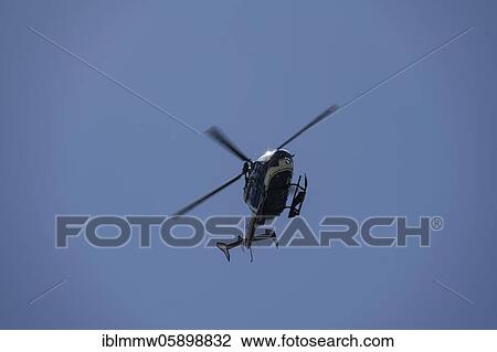 Helicopter in flight, blue sky, alpine rescue, mountain rescue, Chamonix, Haute-Savoie, France, Europe View Large Photo Image Stock Image - Helicopter in flight, blue sky, alpine rescue, mountain rescue, Chamonix, Haute-Savoie, France, Europe. Fotosearch