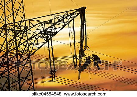 Stock Photo - High-voltage engineers at work, Baden-Württemberg, Germany, Europe. Fotosearch