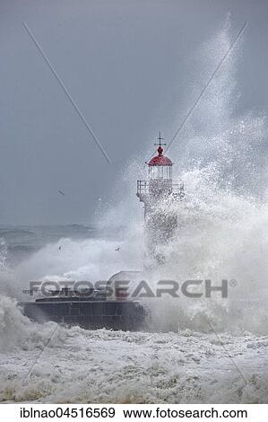 High waves, splashing spray, lighthouse during storm, Porto, Portugal, Europe View Large Photo Image Stock Photo - High waves, splashing spray, lighthouse during storm, Porto, Portugal, Europe. Fotosearch
