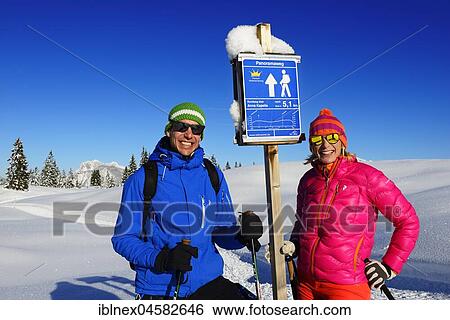 Hikers in the snow on the signposts Panoramaweg, Premium winter hiking trail, Hemmersuppenalm, Reit im Winkl, Chiemgau, Oberbayern, Bavaria, Germany, Europe View Large Photo Image Stock Photograph - Hikers in the snow on the signposts Panoramaweg, Premium winter hiking trail, Hemmersuppenalm, Reit im Winkl, Chiemgau, Oberbayern, Bavaria, Germany, Europe. Fotosearch