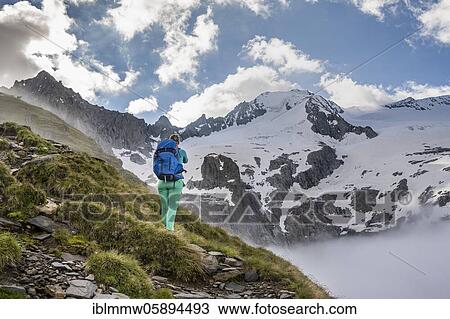 Hiking in front of snow-covered mountain peaks, Furtschaglspitze and Großer Möseler, ascent to Schönbichler Horn, Furtschaglkees glacier, Berliner Höhenweg, Zillertal Alps, Zillertal, Tyrol, Austria, Europe View Large Photo Image Stock Image - Hiking in front of snow-covered mountain peaks, Furtschaglspitze and Großer Möseler, ascent to Schönbichler Horn, Furtschaglkees glacier, Berliner Höhenweg, Zillertal Alps, Zillertal, Tyrol, Austria, Europe. Fotosearch