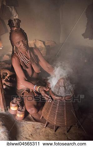 Himba woman, disinfecting clothes, Kaokoveld, Namibia, Africa View Large Photo Image Stock Image - Himba woman, disinfecting clothes, Kaokoveld, Namibia, Africa. Fotosearch