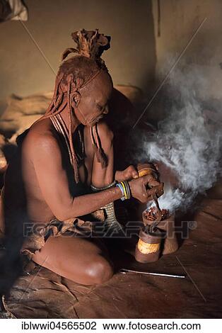 Himba woman, disinfecting clothes, Kaokoveld, Namibia, Africa View Large Photo Image Stock Image - Himba woman, disinfecting clothes, Kaokoveld, Namibia, Africa. Fotosearch
