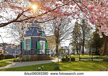 Historical rococo garden house in spring, City park, Radevormwald, Bergisches Land, North Rhine-Westphalia, Germany, Europe View Large Photo Image Stock Image - Historical rococo garden house in spring, City park, Radevormwald, Bergisches Land, North Rhine-Westphalia, Germany, Europe. Fotosearch